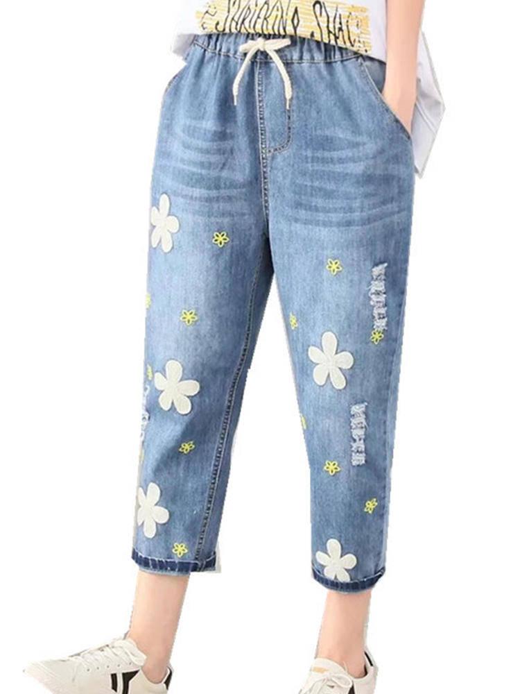 

Повседневная цветочная вышивка Синяя джинсовая ткань Джинсы
