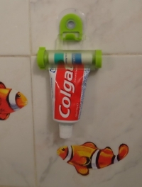 Rolling Toothpaste Tube Squeezer and Mirror Hanger Holder