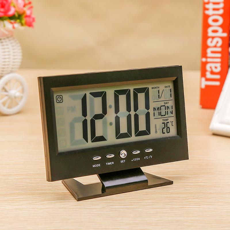 

LCD Voice Activated Induction Digital Calendar Electronic Alarm Clock