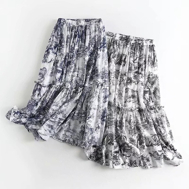 

Европейский и американский стиль Новые женские ретро с высокой талией Свободные тонкие чернила печати Длинные плиссированные юбки
