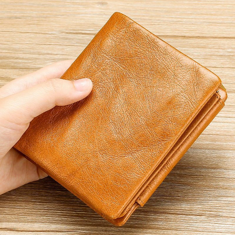 

Men Genuine Leather Vintage Tri-fold Wallet