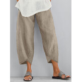 Pantalon ample à taille élastique et poches latérales pour femmes de couleur unie