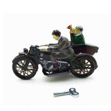 Motocykl z pasażerem w bocznym wózku, zegarowym mechanizmem nakręcany zabawka z pudełkiem