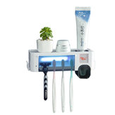 Держатель для зубных щеток с УФ-стерилизатором и экструзором для зубной пасты с чашей
