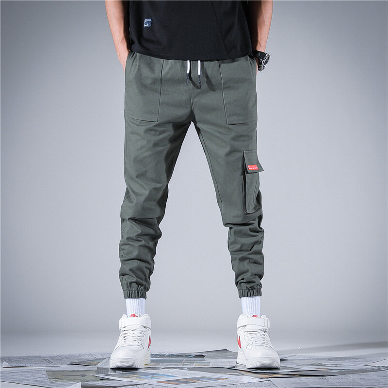 Férfi nadrág tavasz nyár Hip Hop Slack Bottom Joggers Street-wear Drawstring Állítható túrázó, sport- és kerékpáros nadrág.